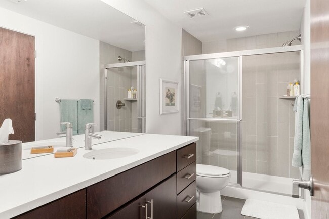 Building Photo - Modern 4BR/3.5BA Duplex with Finished Base...