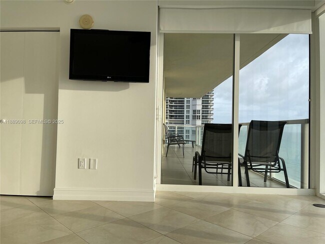 Building Photo - 16699 Collins Ave