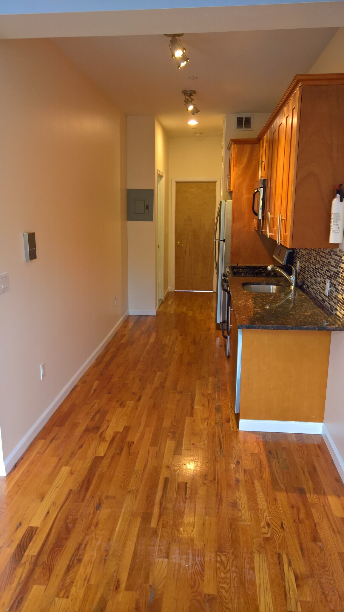 Kitchen to bedroom - 159 E 121st St