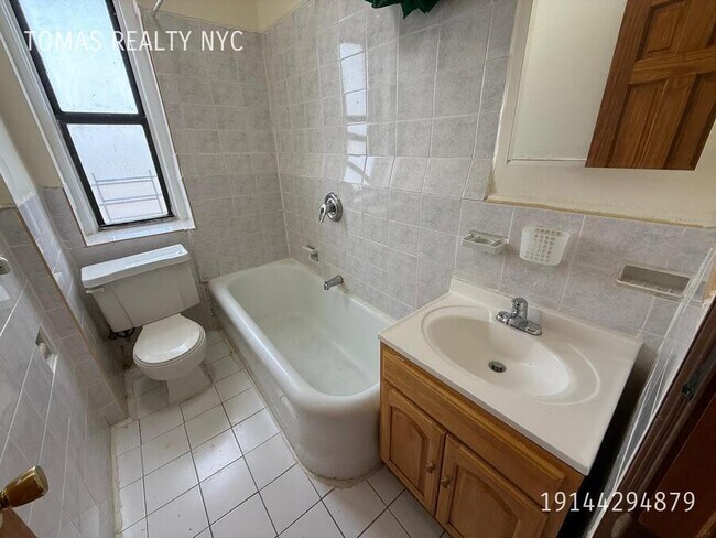 Building Photo - 710 E 235th St