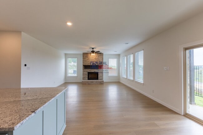 Building Photo - Beautiful 4 Bedroom Home with Covered Patio & Hill Country Views