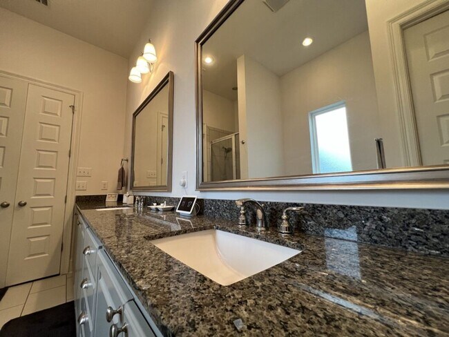 Building Photo - Luxury 4BR Home in Americana | 11 Ft Ceilings, Courtyard Living & Furnished Option