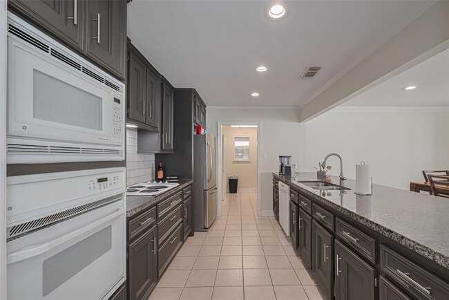 Building Photo - 24 Champions Colony E