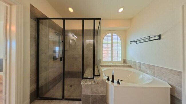 Building Photo - Immaculate 4-Bedroom Home with Luxury Upgr...