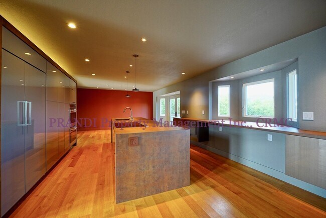 Building Photo - Sleek, Expansive, Designer Home with Priva...