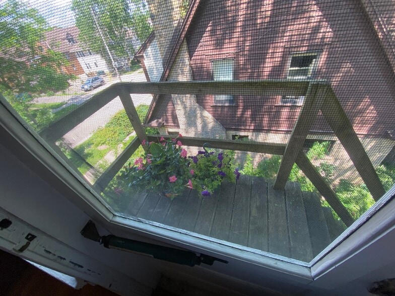 Back porch for plants - 1938 Kendall Ave