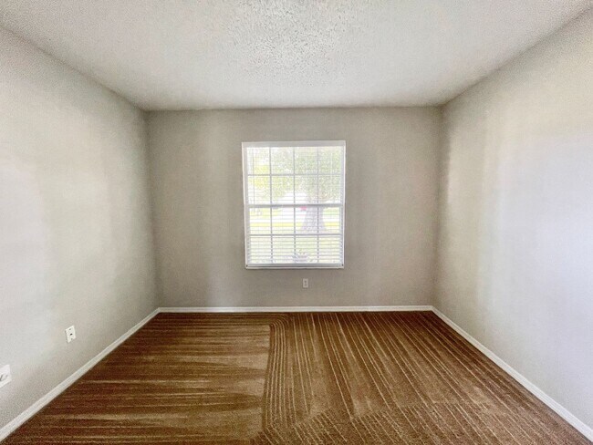 Building Photo - Cute 4/2 EAST Orlando Home in Wedgefield!