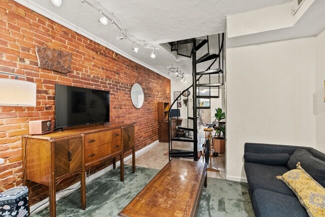 Building Photo - Charming Row Home | 2 Bed | 1 Bath | 950 Sf | Fenced Backyard | 2 Surface Parking Spaces