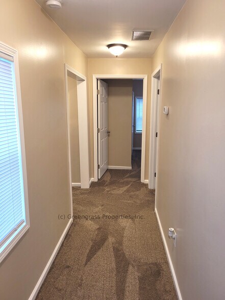 Hallway to all 3 Bedrooms - 205 S 6th St