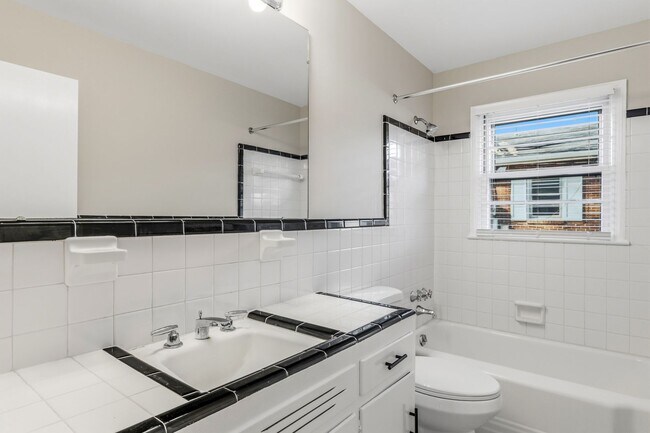 Building Photo - NW - Large Brick Ranch, Updated, Hardwoods, LR, DR, Den, Two Decorative Fire Places, Fenced, Stor...