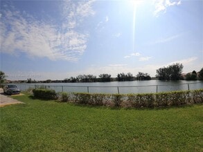 Building Photo - 9911 W Okeechobee Rd