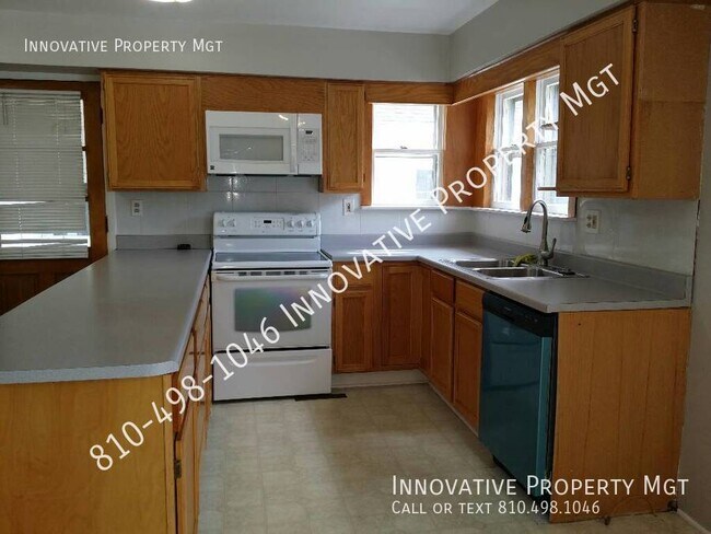 Building Photo - Spacious 4 bedroom , 1 1/2 bath home in Ga...
