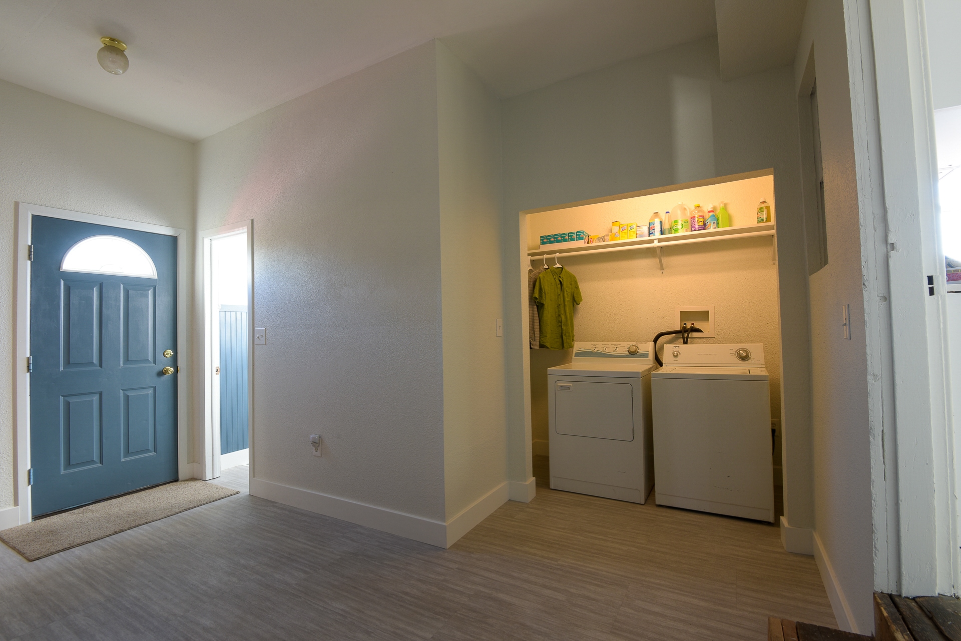 Large laundry area with shelf and hanging rod - 4404 Sherman St