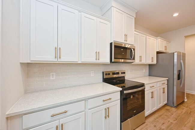 Building Photo - **BE THE LUCKY ONE TO LIVE IN THIS 2024-BUILT TOWNHOME**