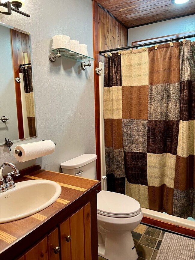 Building Photo - Cozy 3-Bed 2-Bath Cabin-Style Home Nestled...