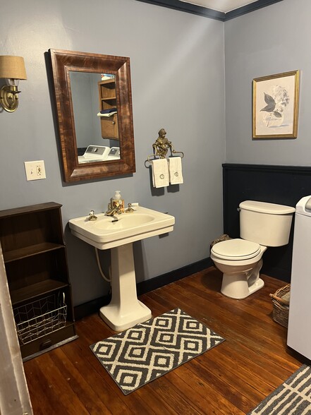 Half bath off mudroom with utility closet and laundry. - 11 Kellogg St