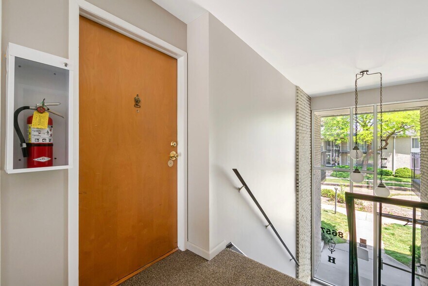 Building Photo - 8657 Kennedy Cir N