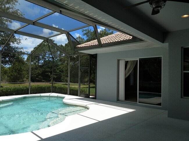 Building Photo - Annual Rental: Luxurious 4 Bedroom 3 bath POOL home in Woodlands of Rivendell! Just Blocks form P...