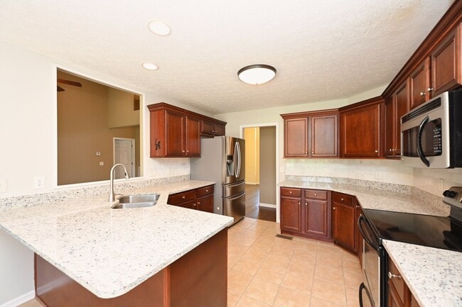 Building Photo - **BEAUTIFUL, WELL-MAINTAINED BRICK HOME ON A LOVELY 0.63-ACRE LOT IN A DESIRABLE NEIGHBORHOOD**