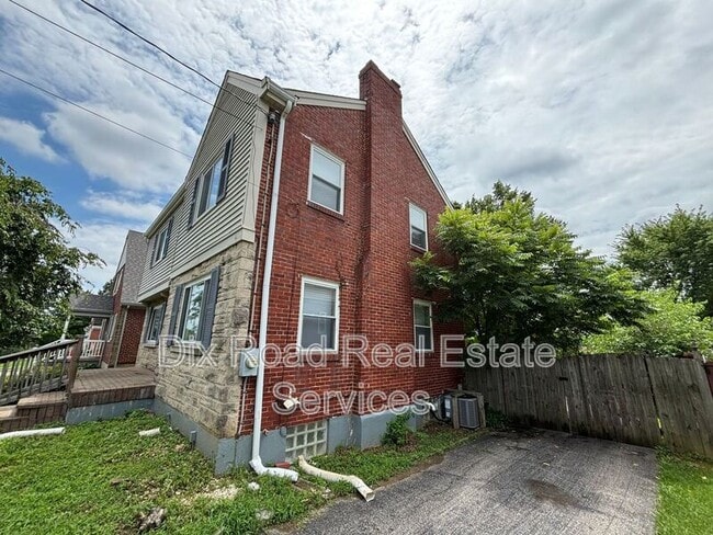 Building Photo - 5587 Surrey Ave