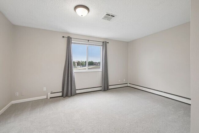 Building Photo - Townhome-Style Living with Greenbelt Views, Attached Garage & Community Pool!