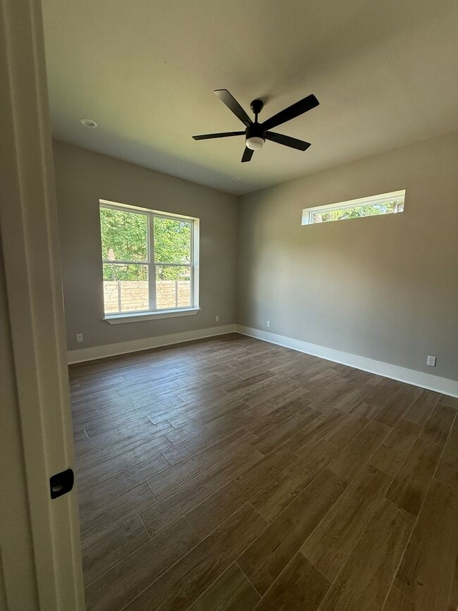 Building Photo - 3/2/1 NEW CONSTRUCTION LISD fenced yard an...