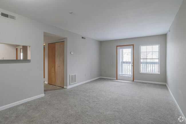 3 BR, 2 BA - Living Room - Town Center Apartments