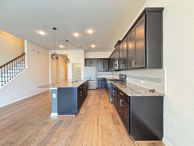 Building Photo - Beautiful 4-Bedroom Home with Free Communi...