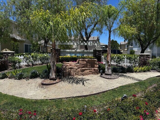 Building Photo - Nestled in a Quiet  Peaceful Valencia Community is ...