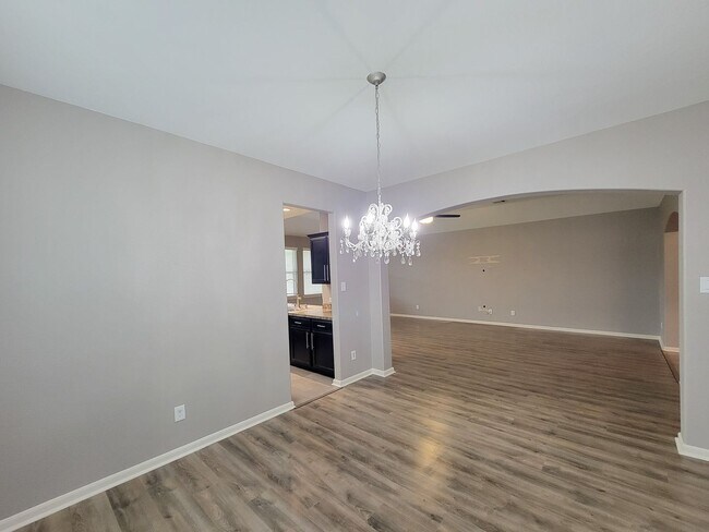 Building Photo - Welcome to this charming one-story home fe...