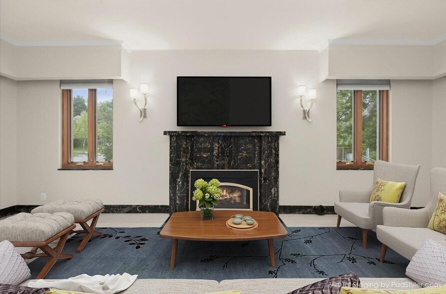 marble fireplace with matching baseboards and window sills - 3007 Oliver St NW