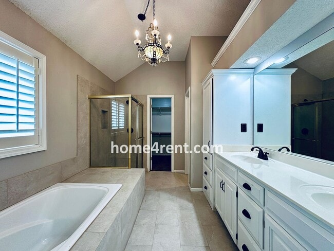 Building Photo - Updated Kitchen, Large Two Tiered Deck, Finished Basement in Blue Valley Schools!