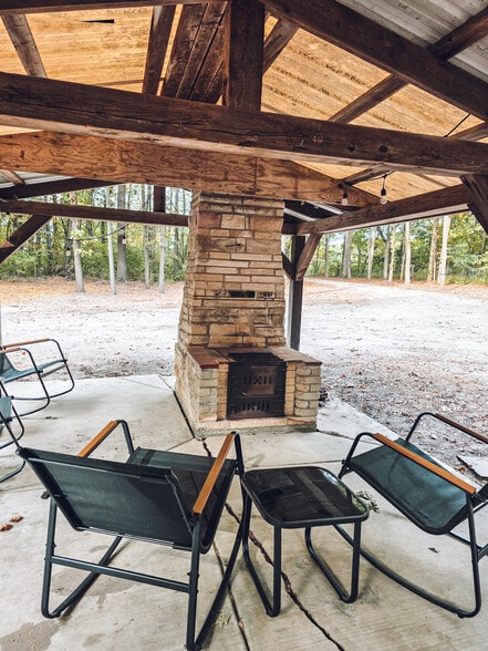 Outdoor pavilion with fireplace - 1008 W Singing Woods Rd