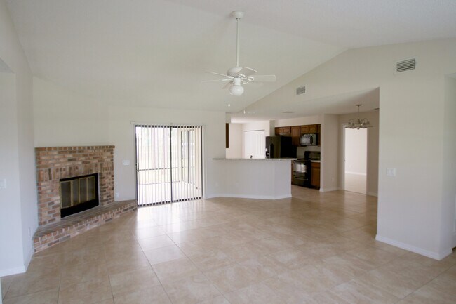 Building Photo - Spacious 3BR/2BA Home | Large Yard | Lawn Care Included | Prime Port St. Lucie Location
