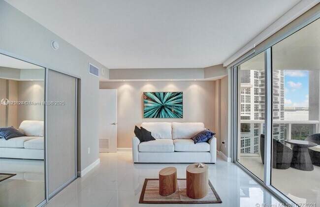 Building Photo - 10275 Collins Ave