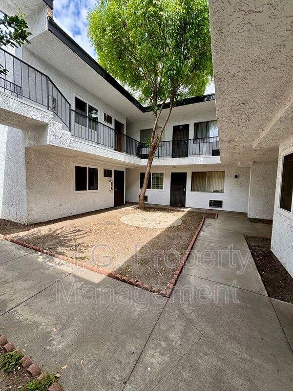 Building Photo - 10635 Sherman Grove Ave