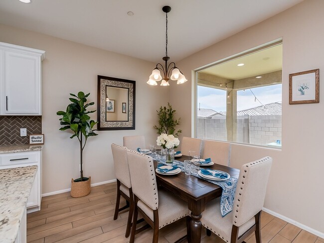 Building Photo - Amazing 4BR 2.5BA Home w/ 3-Car Tandem Garage • Pool Access • Yard w/ Fire Pit in Saguaro Trails