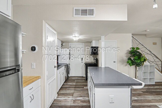 Building Photo - SE!! Close to UNLV!! 2 Bedroom 2 story!! 1 Car Carport!! Fully Furnished!! Community Pool!! and T...