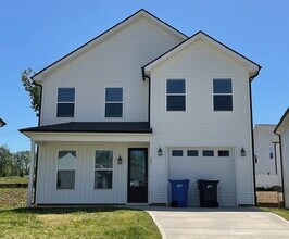 Building Photo - Sign a 12-month lease now and receive the ...
