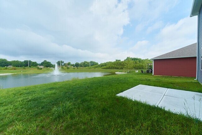 Building Photo - 4 Bedroom at Trotter's Landing in Camby With Pond View!