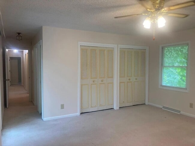 Building Photo - Beautiful Duplex Located in Serene, Wooded...