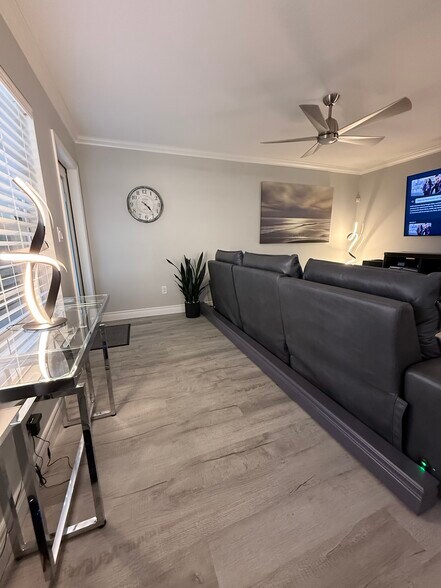 Custom cable box to hide sofa electronics - 10 Vista Palm Ln