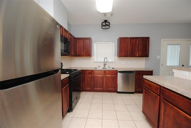 Building Photo - 8319 Greys Ln