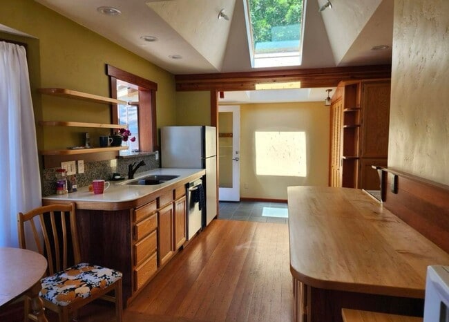 Building Photo - Renovated In-Town Home with Creek & Garage