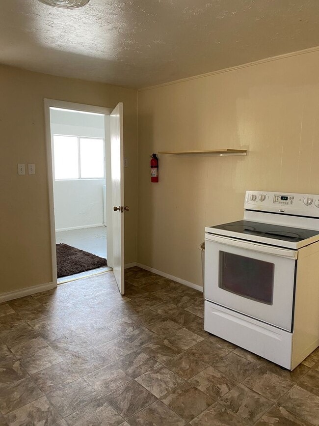 Building Photo - Cozy 2-Bedroom Home with Spacious Yard – C...