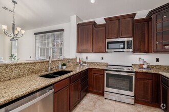 Building Photo - Newly updated townhouse with 2 car garage!