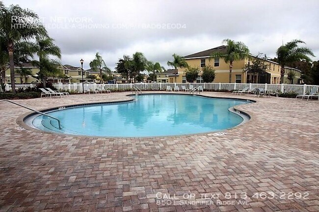 Building Photo - Stunning 2-Bedroom Townhouse in the Desirable Gated Community of The Hammocks!