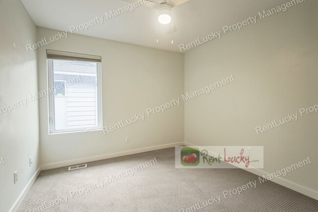 Building Photo - Immaculate and LARGE 4-Bedroom Home in Unb...