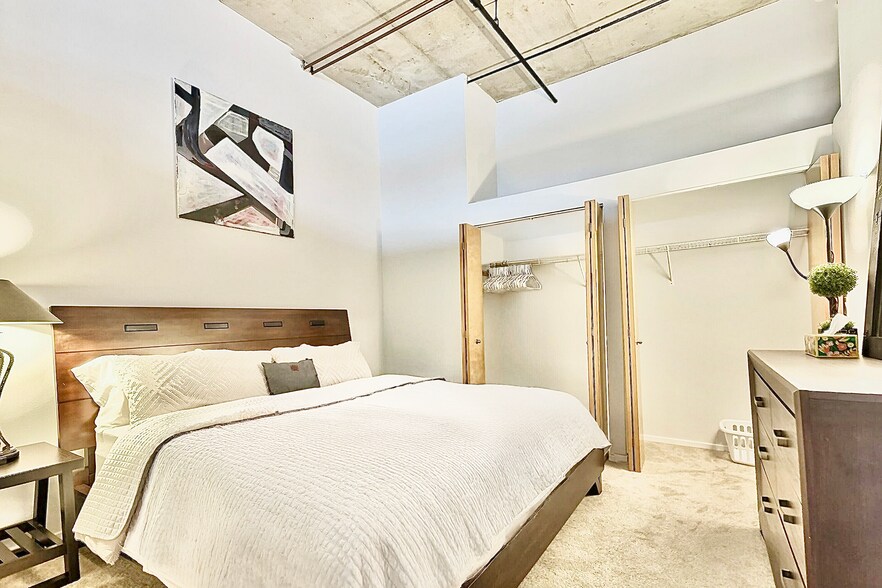 King bed, lots of closet space, dresser w/ mirror, extra towels and linens included (not pictured) - 6 S Laflin St