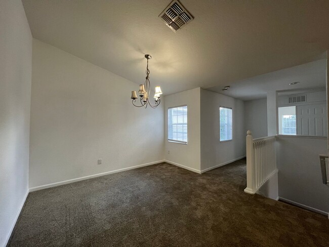 Building Photo - Beautiful 3 Bed 2 Bath with a Den Gated Co...